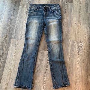 Buckle black boot cut jeans